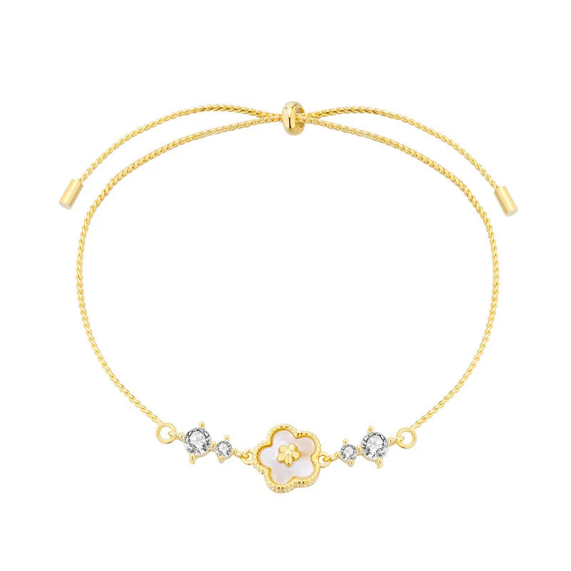 Blanche Clover Bracelet with white shell clover in gold