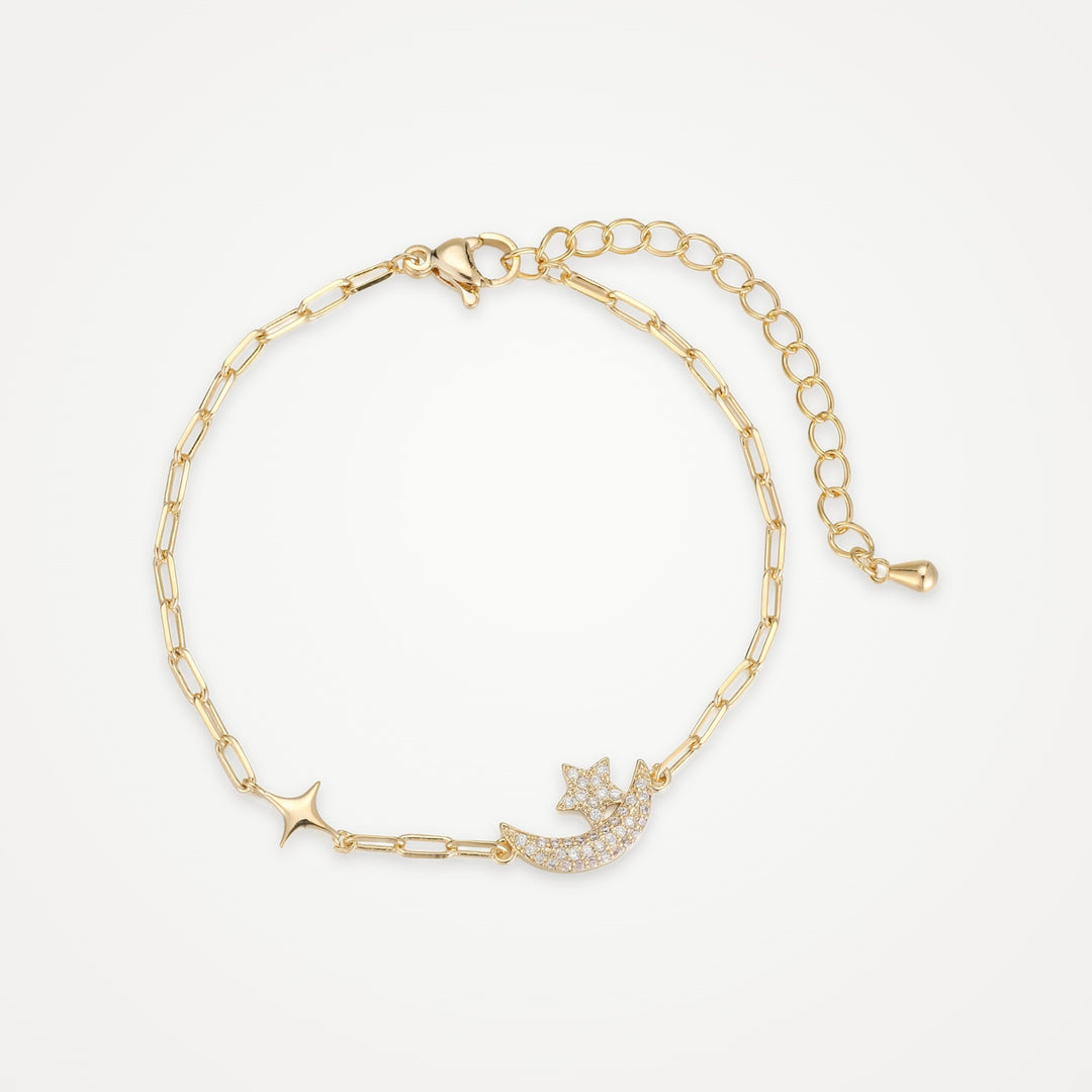 Céleste Moon & Star Bracelet in gold lying flat