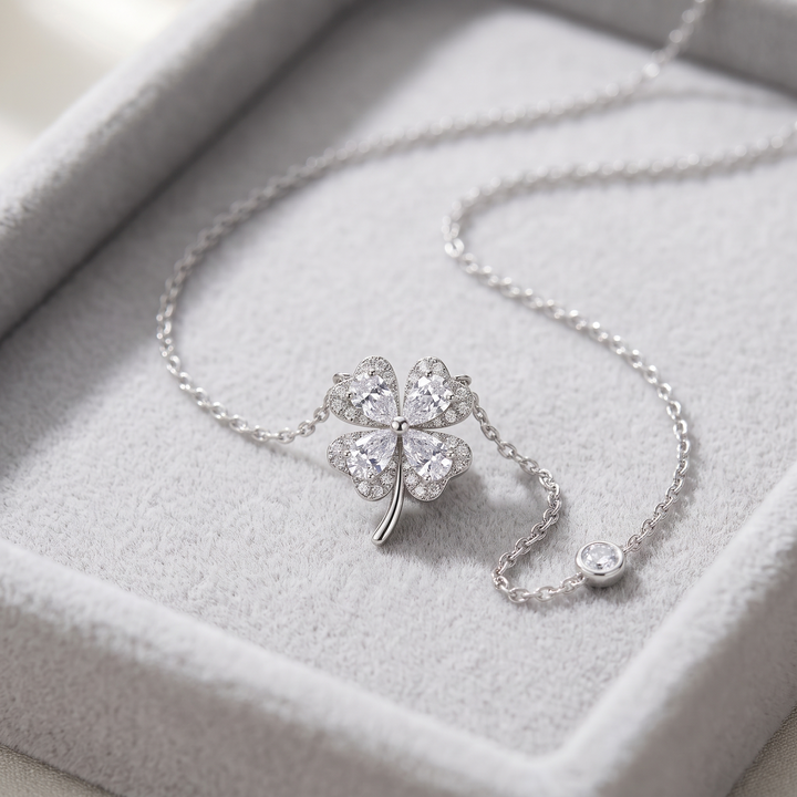 Aurora Clover Necklace on a grey velvet tray