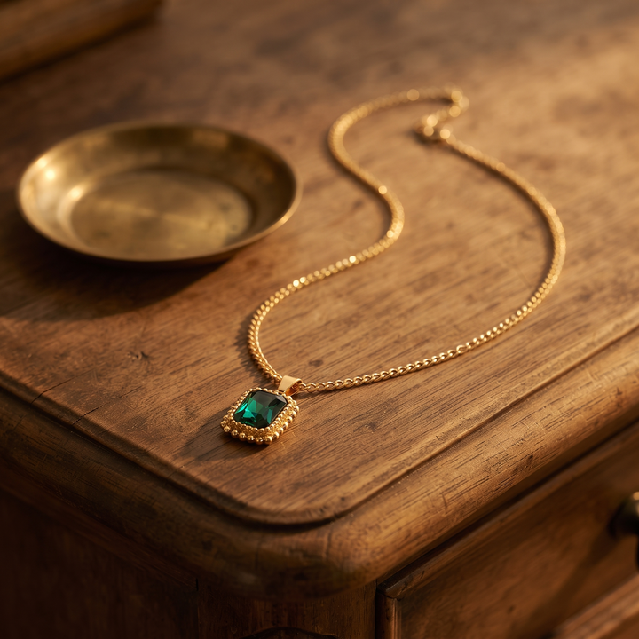 Vintage Gemstone Pendant Necklace on an antique dresser