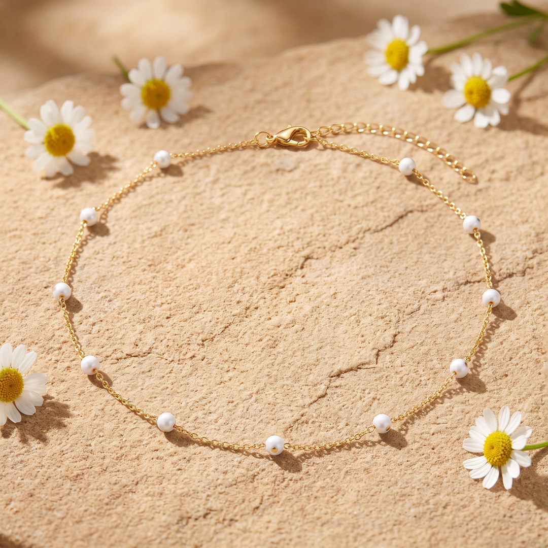 White Enamel Bead Choker on sandstone with daisies