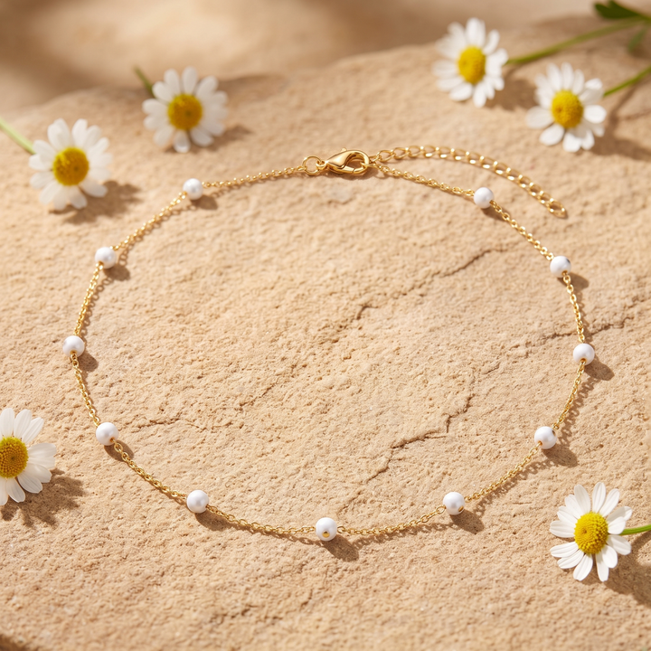 White Enamel Bead Choker on sandstone with daisies