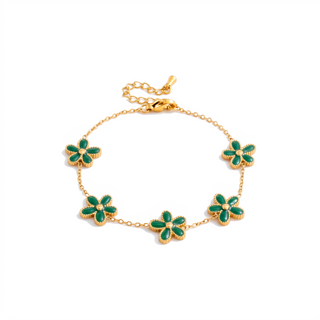 Lucky Petal Bracelet with green enamel petals on white background