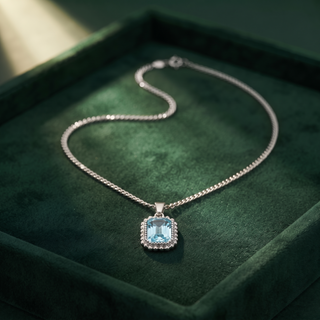 Vintage Gemstone Pendant Necklace, silver with aquamarine, on green velvet