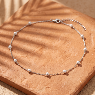White Enamel Bead Choker in silver on terracotta