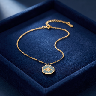 North Star Pendant Necklace on navy velvet