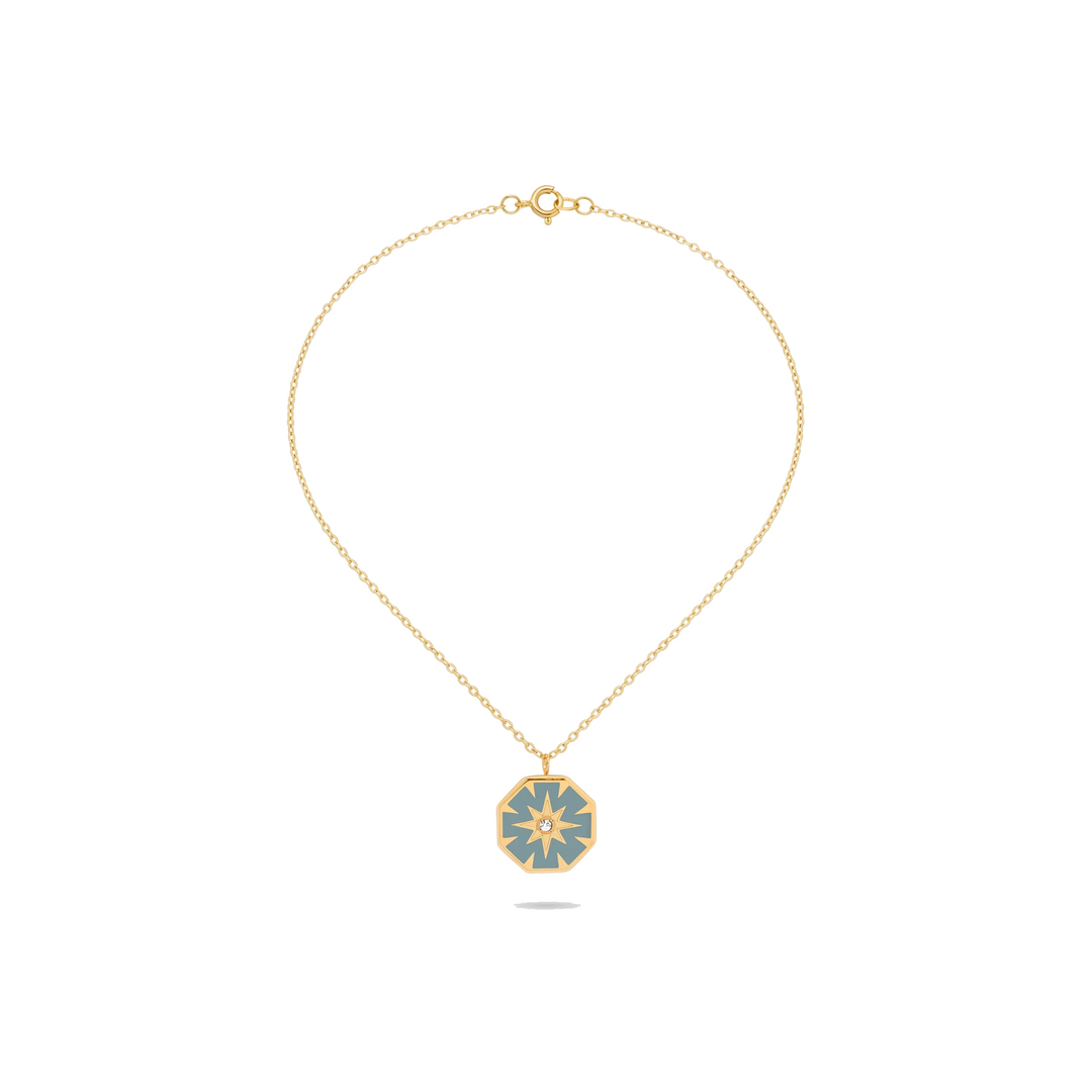North Star Pendant Necklace in gold on white background