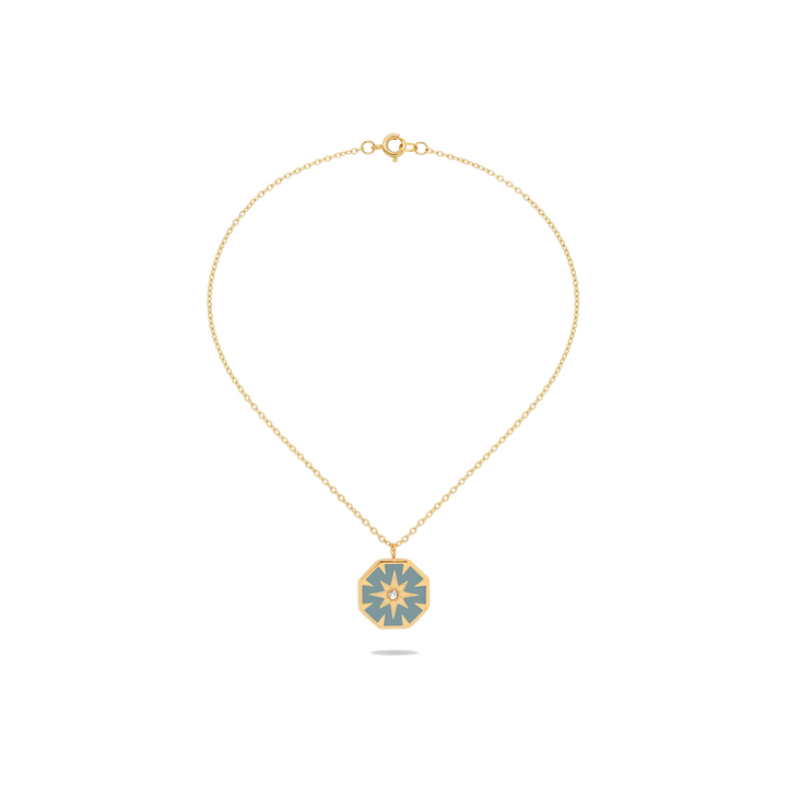 North Star Pendant Necklace in gold on white background