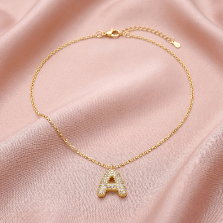Bubble Initial Crystal Necklace on blush silk