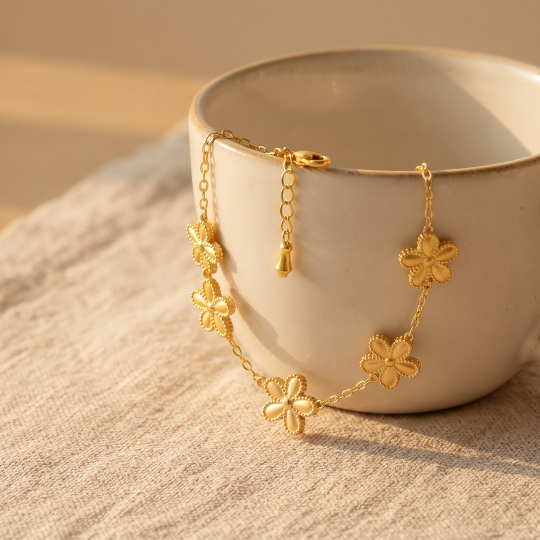 Lucky Petal Bracelet draped over a ceramic cup