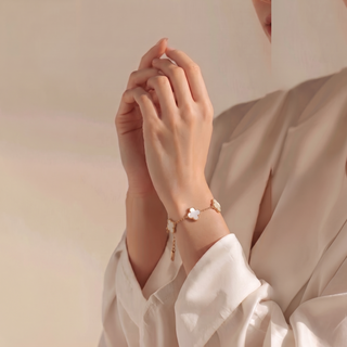 Lumière Clover Bracelet worn on the wrist