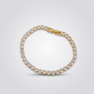 Petite Tennis Bracelet in gold-tone, angled view showing the box clasp and round stones