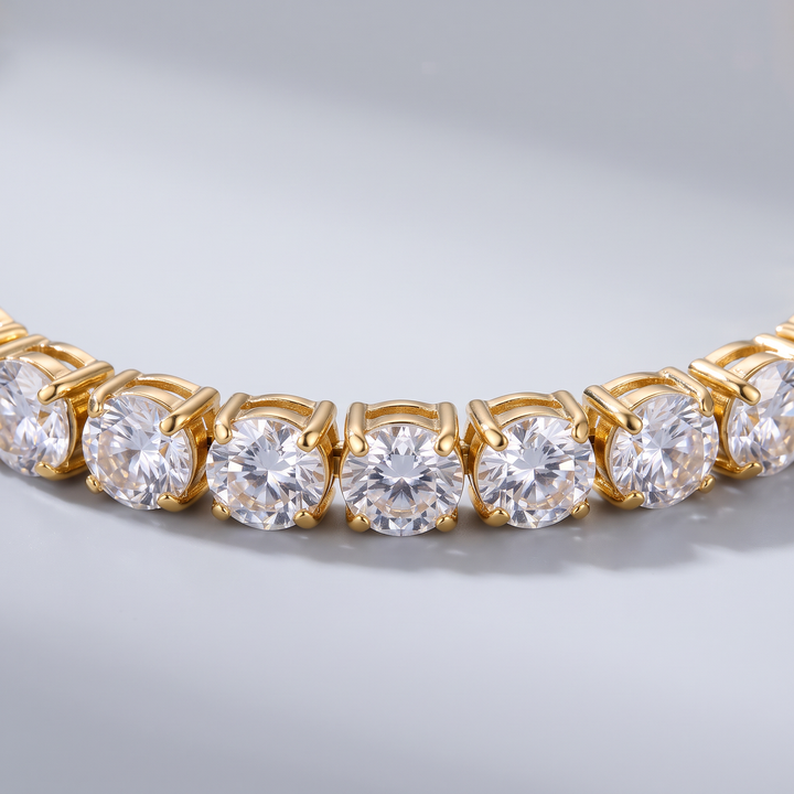 Close-up of the Petite Tennis Bracelet showing the small round clear stones in square gold-tone settings