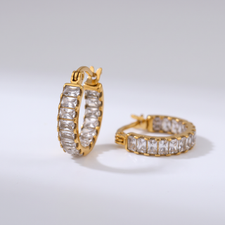 Tennis Huggie Hoops seen from an angle showing the curve of the hoop and the clear stones