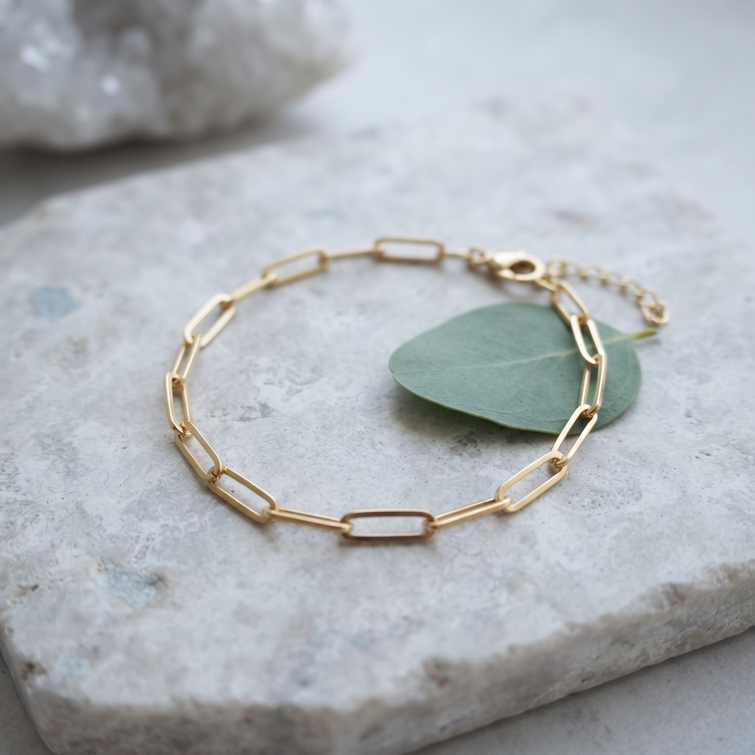 Paperclip Chain Bracelet on grey stone with eucalyptus