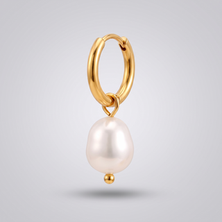 Pearl Drop Huggies in gold: close-up detail of the freshwater pearl and its jump ring on the hoop