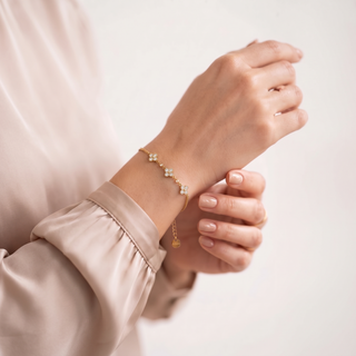Petite Clover Bracelet worn on the wrist