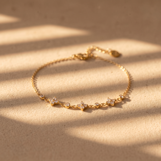 Petite Clover Bracelet on sandstone in sunlight