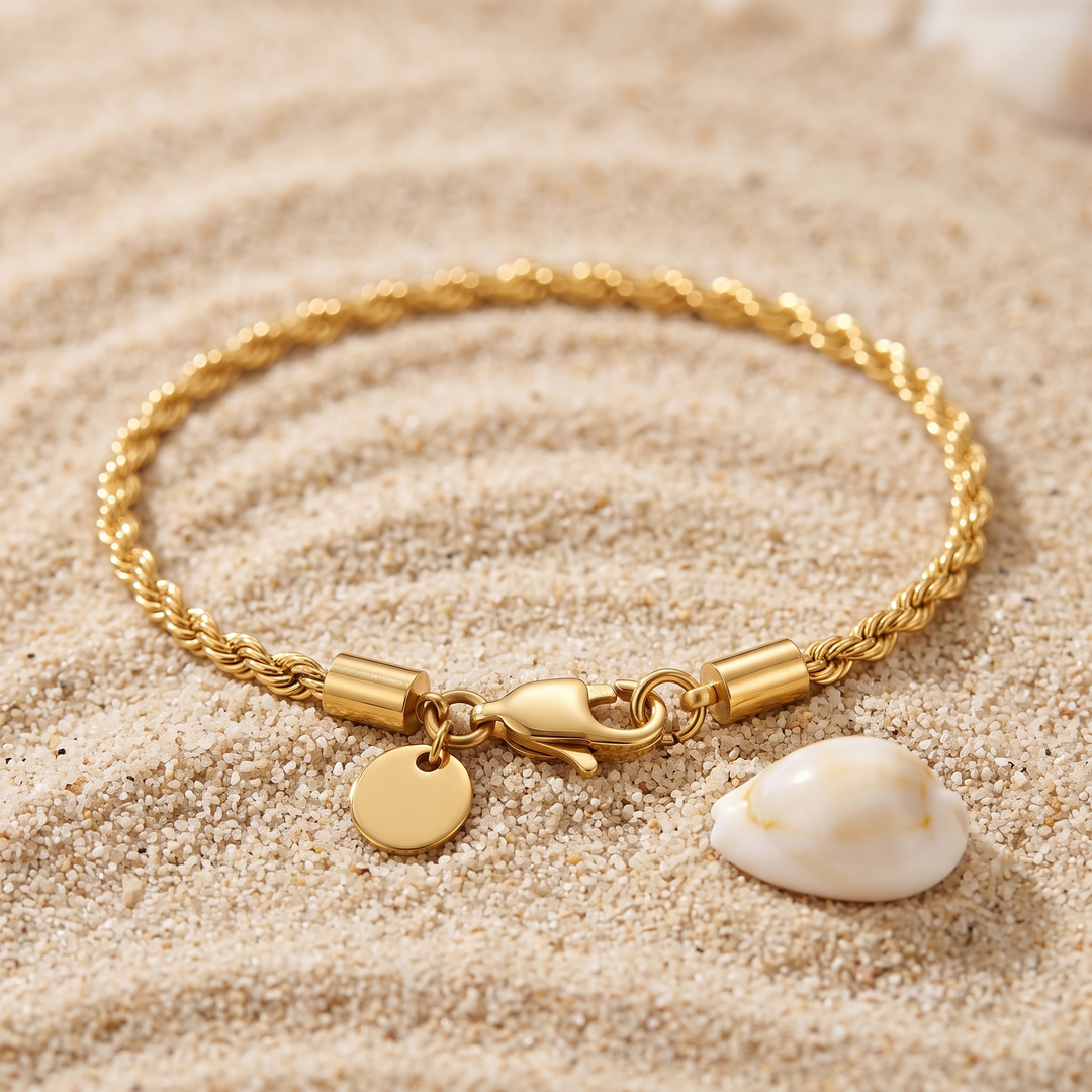 Rope Chain Bracelet on sand with a seashell