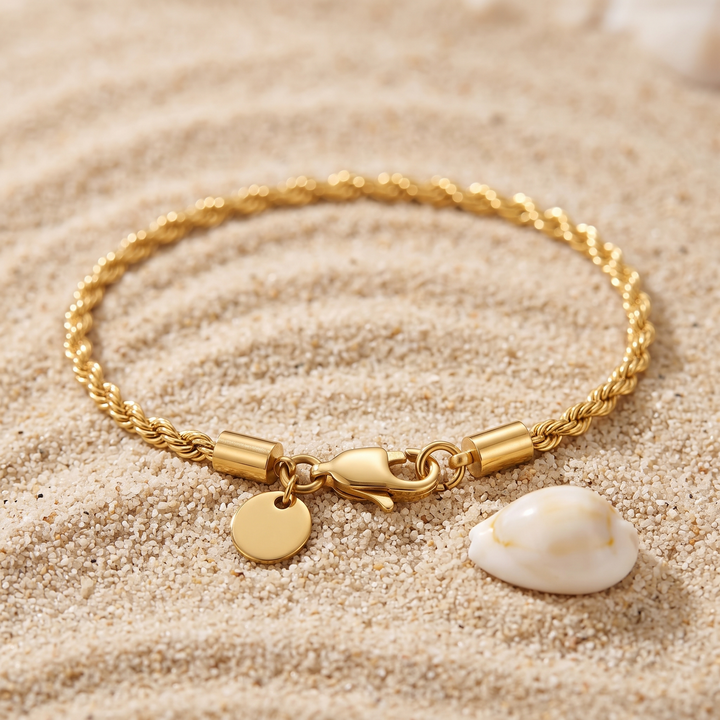 Rope Chain Bracelet on sand with a seashell