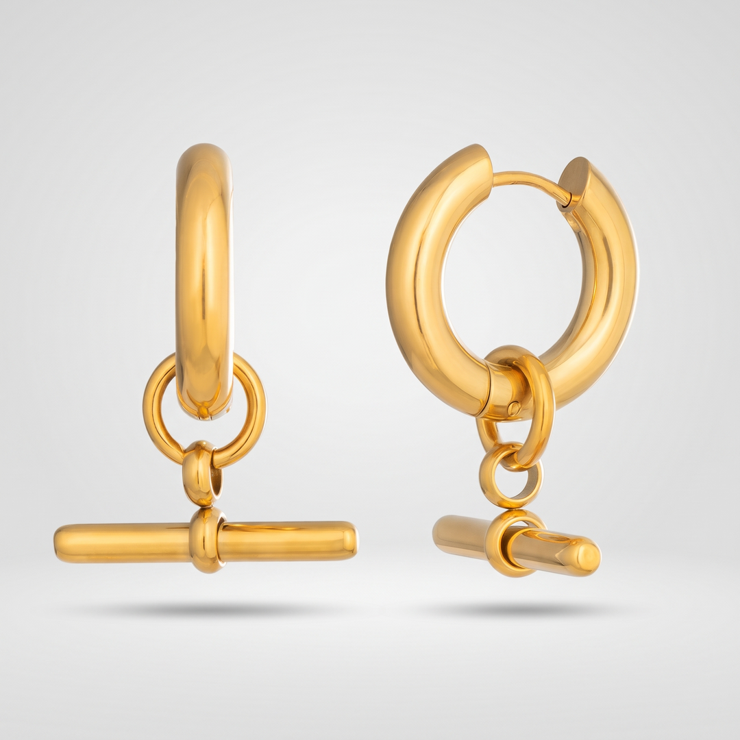 Moshié T-Bar Hoops in gold-tone, front view of the pair on a grey studio background